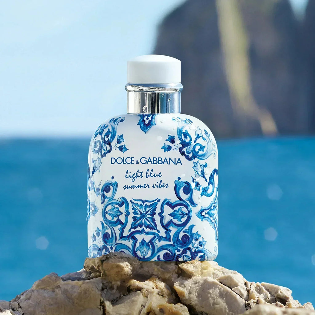 Dolce & Gabbana Light Blue Pour Homme summer fragrance bottle for men, featuring a sleek blue design and authentic luxury look