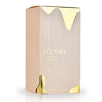 Lattafa Eclaire women’s perfume by Hub Wavy, 3.4 oz bottle, elegant luxury fragrance, displayed with perfume cap and packaging.