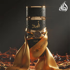 Lattafa Asad unisex perfume by Hub Wavy, 100ml bottle, elegant glass container with a sleek design.