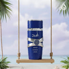 Hub Wavy Lattafa ASAD ZANZIBAR perfume bottle, 100ml unisex fragrance with sleek design and elegant packaging.