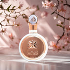 Hub Wavy Lattafa Fakhar perfume bottle for women, luxurious fragrance in 3.4 fl oz / 100 ml bottle, elegant design.