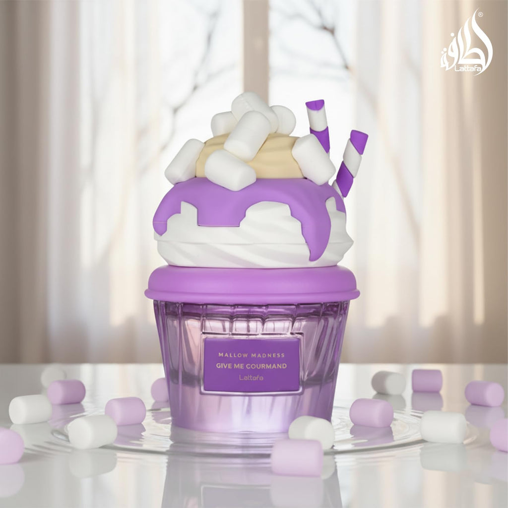 Hub Wavy Lattafa Mallow Madness perfume bottle, 2.6 oz unisex fragrance with elegant design and floral scent.