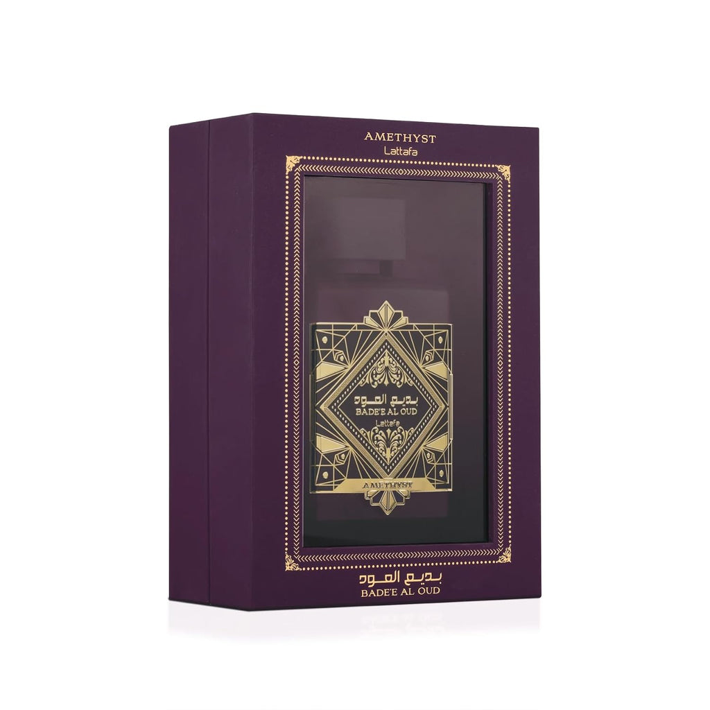 Hub Wavy Lattafa Bade'e Al Oud Amethyst perfume bottle, 3.4 oz, unisex fragrance with elegant purple design, detailed floral accents.