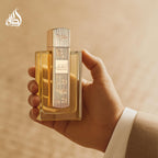 Hub Wavy Lattafa Angham unisex perfume bottle, 3.4 oz, featuring elegant glass packaging with a sleek design.