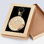 Hub Wavy Lattafa Fakhar Gold Extrait perfume bottle, luxurious unisex fragrance in a 3.4 fl oz/100 ml container.