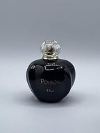 Authentic Dior Poison 3.4 oz perfume bottle for women, featuring elegant glass design and gold accents.