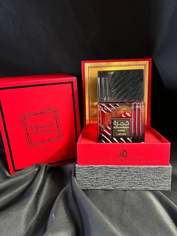 Hub Wavy Lattafa Khamrah Karaz perfume bottle, luxury unisex fragrance with sleek design, 3.4 oz (100 ml) size, on a neutral background.