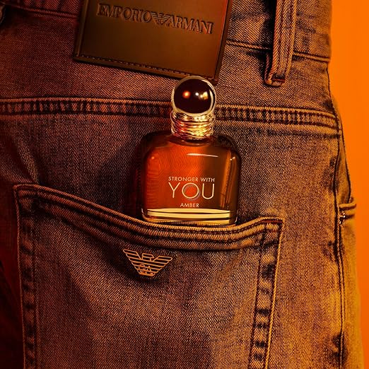 Armani Stronger With You Amber men's fragrance bottle, 3.4 oz, with warm amber scent and elegant design.