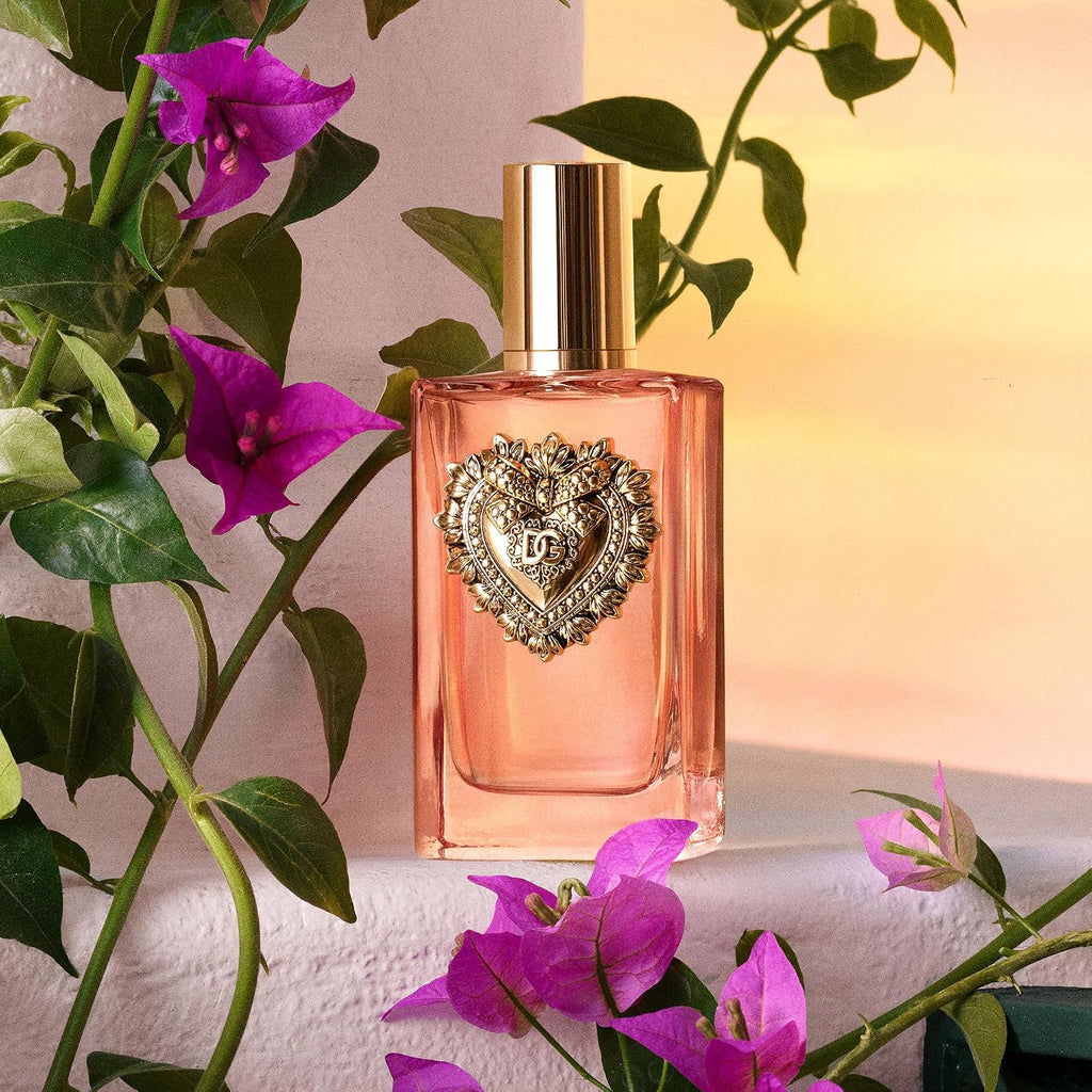Dolce & Gabbana Devotion Intense women's luxury fragrance bottle with ornate design and gold accents.