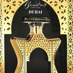 Bond No. 9 Dubai Black Sapphire unisex perfume bottle with dark blue and black design, showcasing the luxurious fragrance packaging.