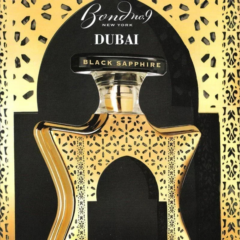 Bond No. 9 Dubai Black Sapphire unisex perfume bottle with dark blue and black design, showcasing the luxurious fragrance packaging.