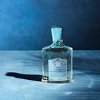 Hub Wavy Creed Virgin Island Water perfume bottle, 3.3 fl oz, unisex luxury fragrance with a sleek design and vibrant packaging.