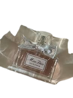Hub Wavy Dior Miss Dior 3.4 oz perfume bottle for women, featuring elegant packaging and classic fragrance design.
