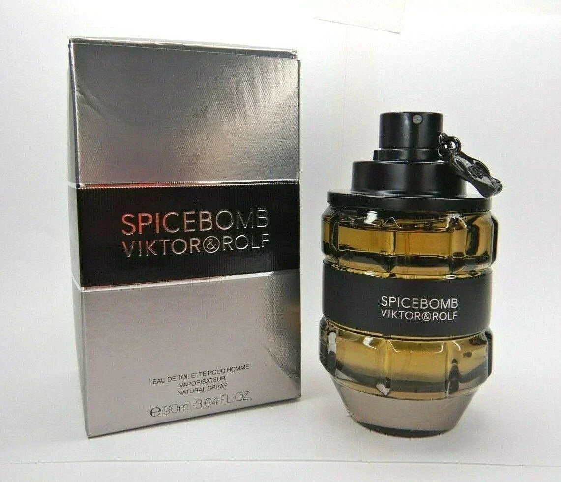 Viktor & Rolf Spicebomb men's fragrance bottle with orange and black design, 3.0 oz / 90 ml, on a neutral background